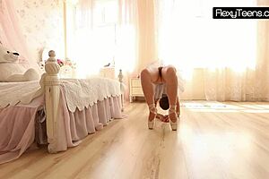 Hottie gymnast with saggy tits does acrobatic poses i love watching her!