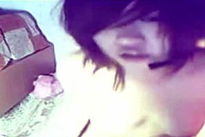 Asian Amateur Engages in Solo Masturbation Softcore Session