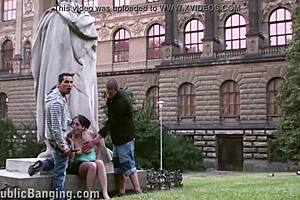 daring public sex threesome by a famous statue in the middle of the city