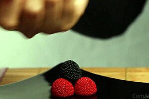 Ever tried a CFNM handjob with candy berries and cum?