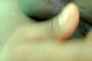 enjoying the thrill of being a caged sissy in lingerie