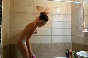 Voyeur catches me in the shower with a close-up on my ass and tits