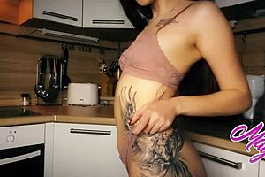 Beautiful Asian babes in black stockings pleasure themselves