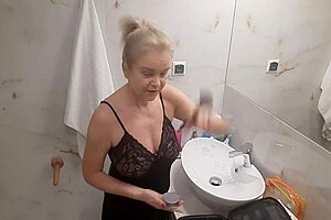 Jenny the blonde prepares for a night out at the disco