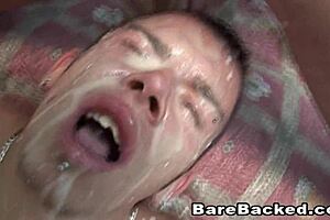 gay couple enjoys intimate moment on sofa