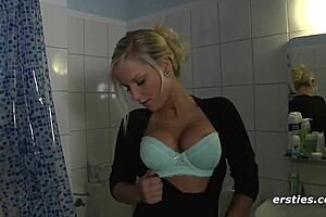 So this hot blonde teen is in the bath, masturbating to an orgasm with her perfect tits on display