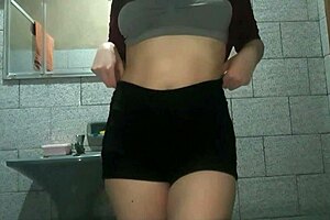 Hiding in the bathroom, I flashed my pussy again.