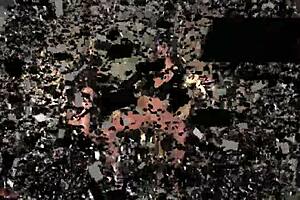 Mistress dominates bound lady with strapon in lesbian bdsm session.