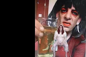 bisexual sissy male naked and exposed while taking a pee then swallowing it