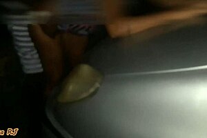 Dancing naked on street leads to car hood encounter