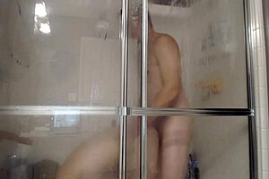 hey, check this out, husband and wife getting it on in the shower with toys
