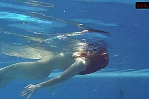 Mia Ferrari Seduces Underwater In Red Lingerie