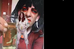 bisexual sissy male naked and exposed while taking a pee then swallowing it