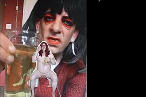 bisexual sissy male naked and exposed while taking a pee then swallowing it