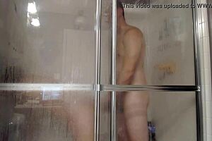 hey, check this out, husband and wife getting it on in the shower with toys