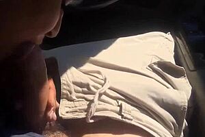 brunette wife sucking in car