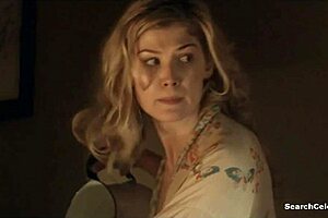 Rosamund Pike shines in Women in Love Ep2 2011, delivering a captivating nude scene with charm.