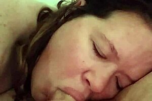 Slutslave1975 relishes sucking hard cock in retro blue film scene.