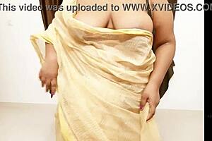 chubby asian aunty showing off her boobs 😏