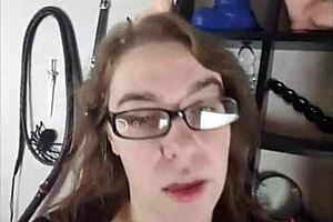 Brunette dominatrix in glasses humiliates with nasty sexting clips