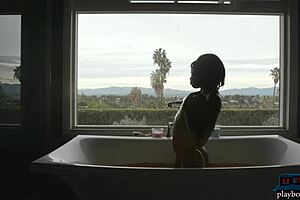 tall black milf model ana foxxx strips down and soaks in a hot bath.