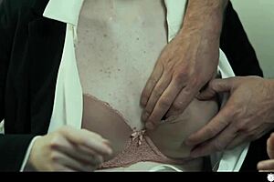 The button stops time as Nathan undresses Hazel Moore in her uniform and explores the scene.