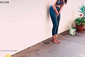 oh man, asian tina's desperate to piss on the balcony in wet leggings!