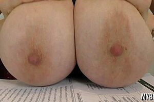 Huge natural tits secretary plays with boobs at work in office!