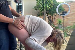 blonde secretary fucked on balcony, shaved pussy exposed