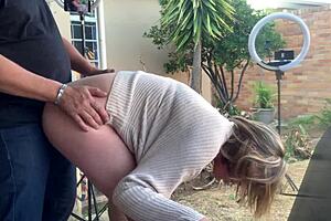 blonde secretary fucked on balcony, shaved pussy exposed