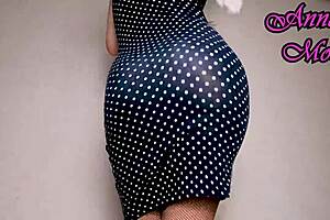 Riding big ribbed dildo in tight dress with gloves