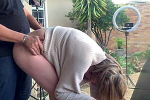 blonde secretary fucked on balcony, shaved pussy exposed