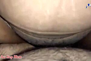 I can't believe I'm sharing a bed with my milf step mom, feeling so horny!