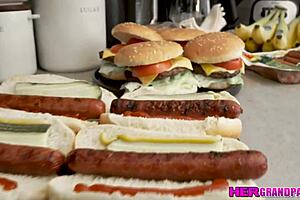 Wow, poor old grandpa Tommy Gunn's swollen cock gets relief from Mae Milano's hand!