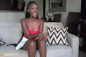 amateur black model deepthroats big white cock in reverse cowgirl