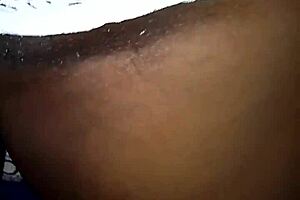 this big booty ebony babe spreads her wet pussy in the bedroom