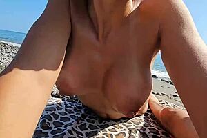 between voyeurs and passers-by, we sneak handjobs on the beach to unwind