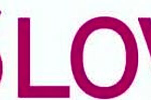 aubry kneels on the sofa for a handjob session