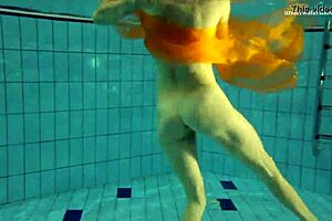 Nastya strips and shows body in pool