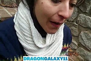 In the public park, the brunette amateur flashes her natural tits before giving a pov oral blowjob near neighbors