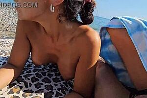 between voyeurs and passers-by, we sneak handjobs on the beach to unwind