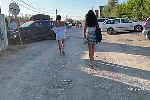 Wow, two girls flashing pussies in public with no panties on!