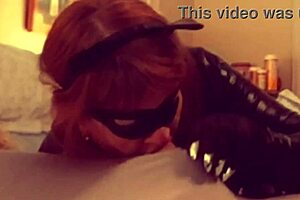 Catgranny passionately sucks batman in deepthroat action