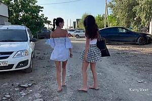 Wow, two girls flashing pussies in public with no panties on!