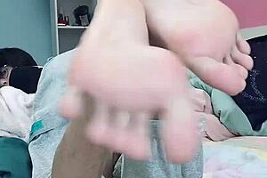 Slim Gay Teen Sucks His Sexy Feet in Foot Fetish Scene.