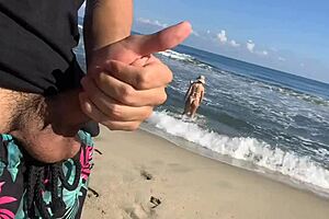 Public beach encounter with two girls helping