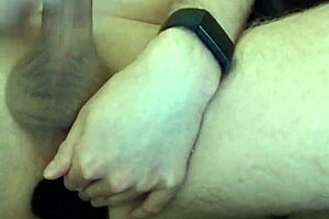 pushing in the large black plug