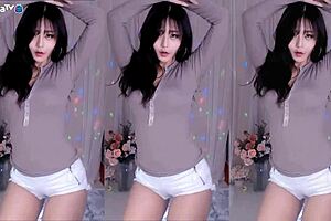 Korean cutie dances and teases with big boobs