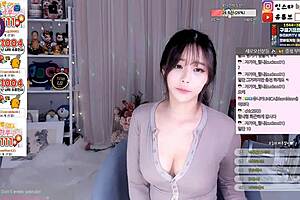 Korean cutie dances and teases with big boobs