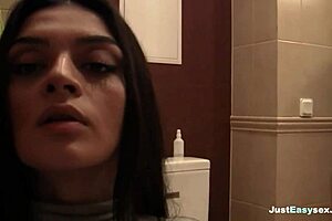 hey, check out this busty babe fingering her hairy pussy in the bathroom 😍